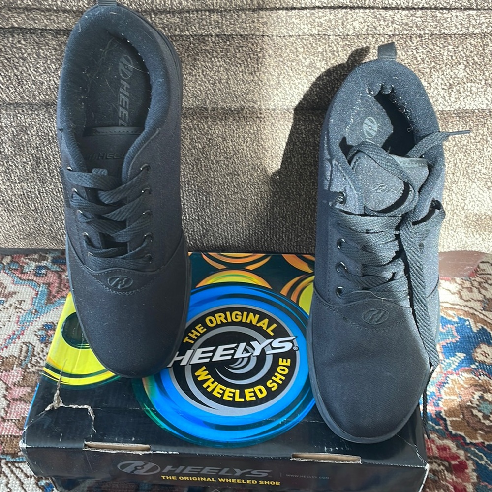 The original Heely’s wheeled tennis shoe